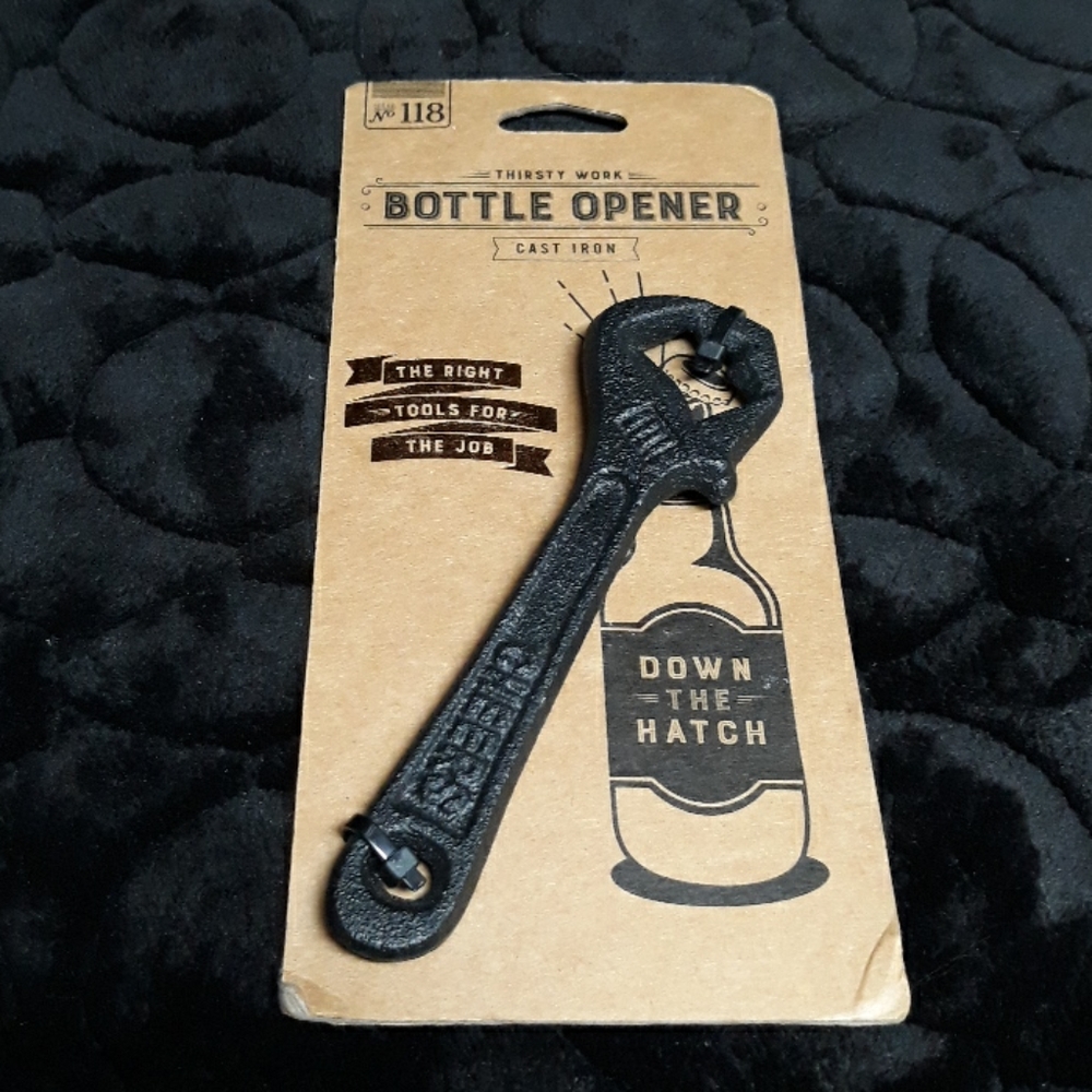 Bell and curfew cast iron bottle opener